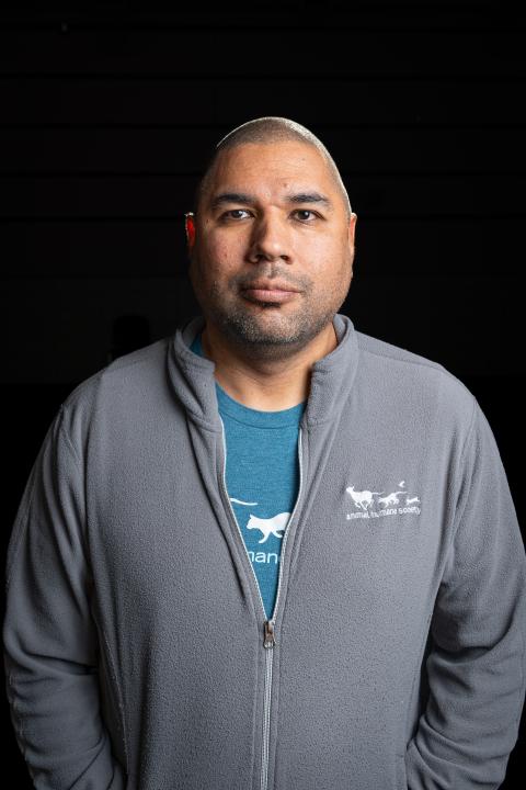 A headshot of Nick G, a dog trainer at Animal Humane Society