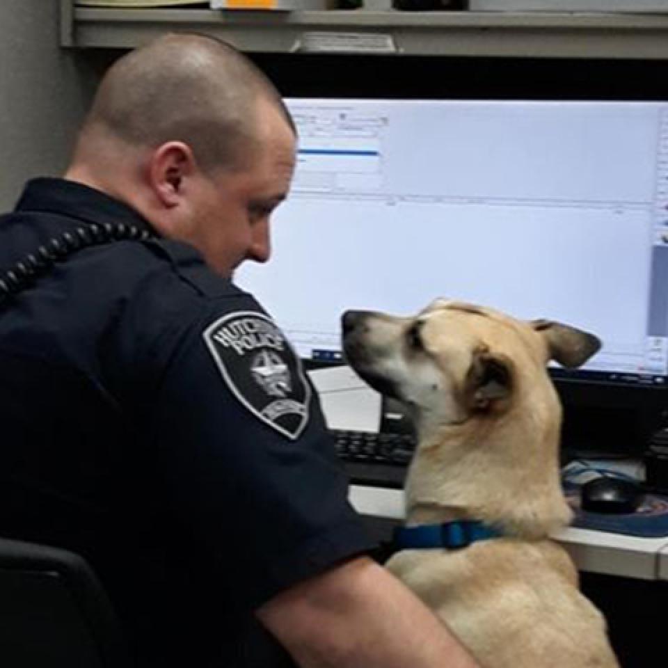 Deeogie and a police officer